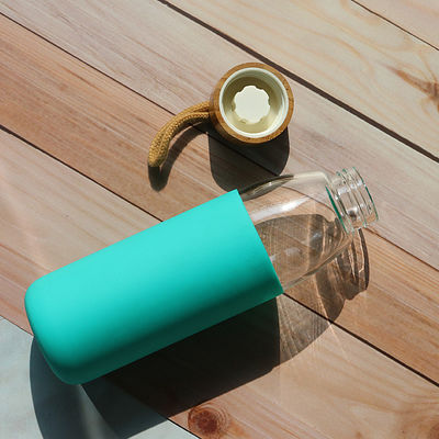manica di bambù rotonda sicura del silicone del coperchio della bottiglia di vetro della lavastoviglie 18oz dura fornitore