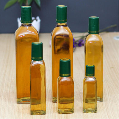 bottiglia di olio d'oliva di vetro 250ml/500ml/750ml con colore della radura del cappuccio parapolvere fornitore