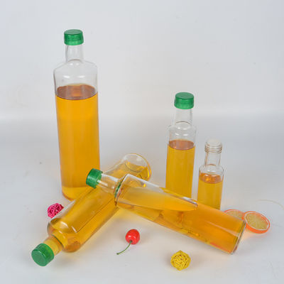 Contenitore di vetro della bottiglia di olio d'oliva della parete spessa con il becco/tappo a vite fornitore