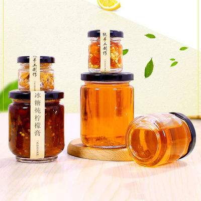 Barattolo di vetro trasparente sicuro del miele resistente alla corrosione per i favori di nozze fornitore