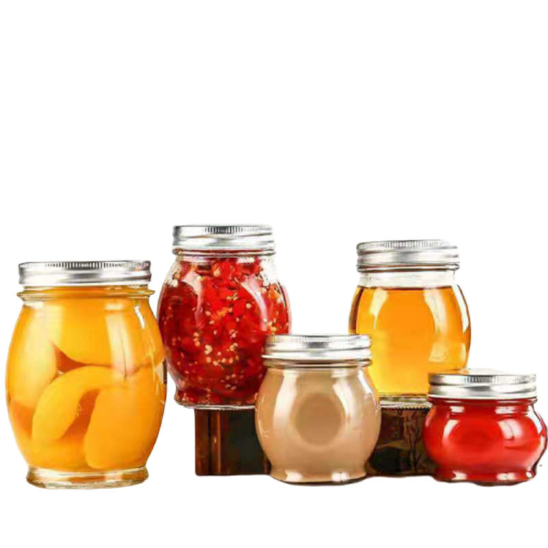 Il barattolo del miele del vetro trasparente del contenitore di alimento con la copertura BPA del metallo libera riutilizzabile fornitore