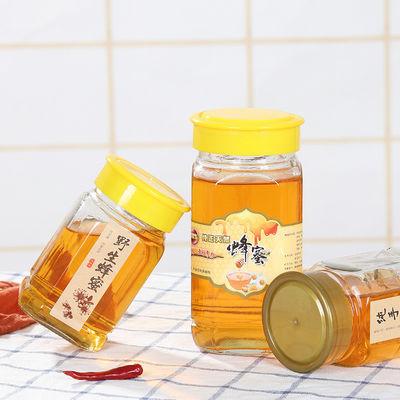 Chiaro barattolo di vetro quadrato vuoto del miele con progettazione classica del coperchio di plastica della vite fornitore
