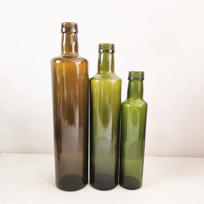 La bottiglia di olio d'oliva di vetro verde scuro ambrata tonda/quadro ha modellato di facile impiego fornitore