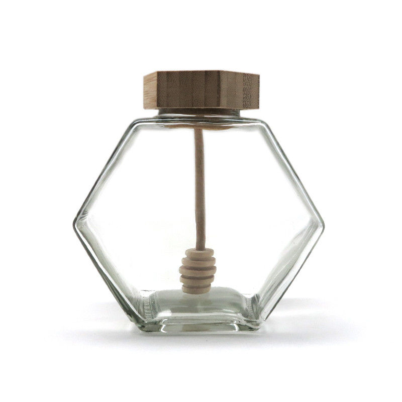 Dispositivo di gocciolamento di bambù di legno di esagono del miele del barattolo del vaso di capacità di vetro vuota del barattolo 12oz fornitore